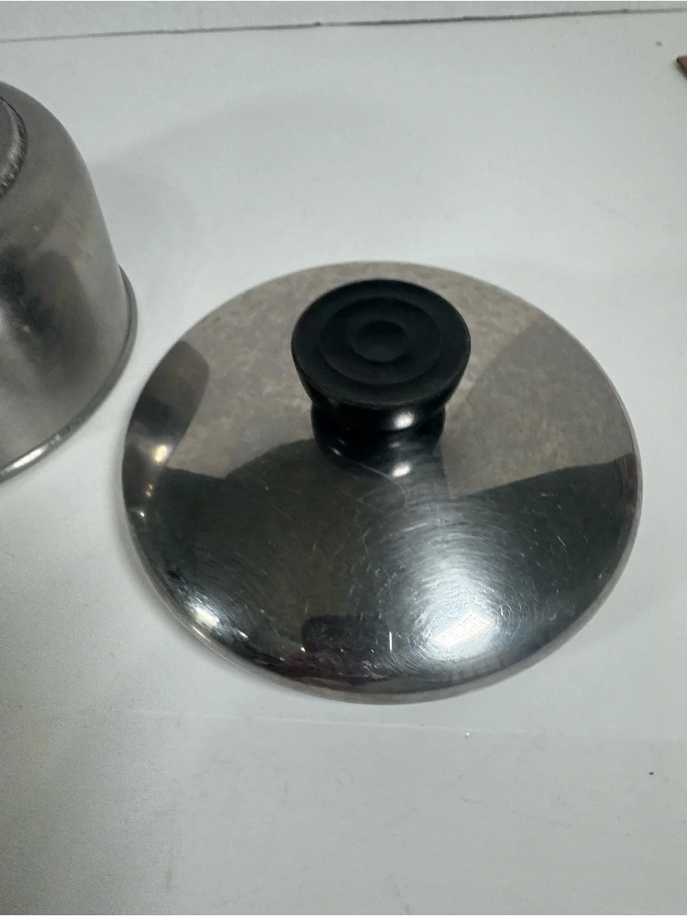 Stainless Steel Saucepan with Black Handle and Lid